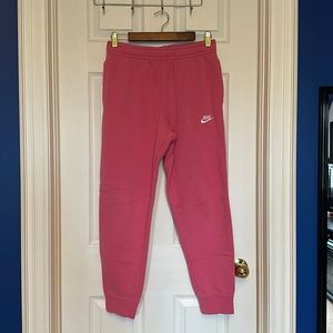 nike | pink women’s track pants in size small